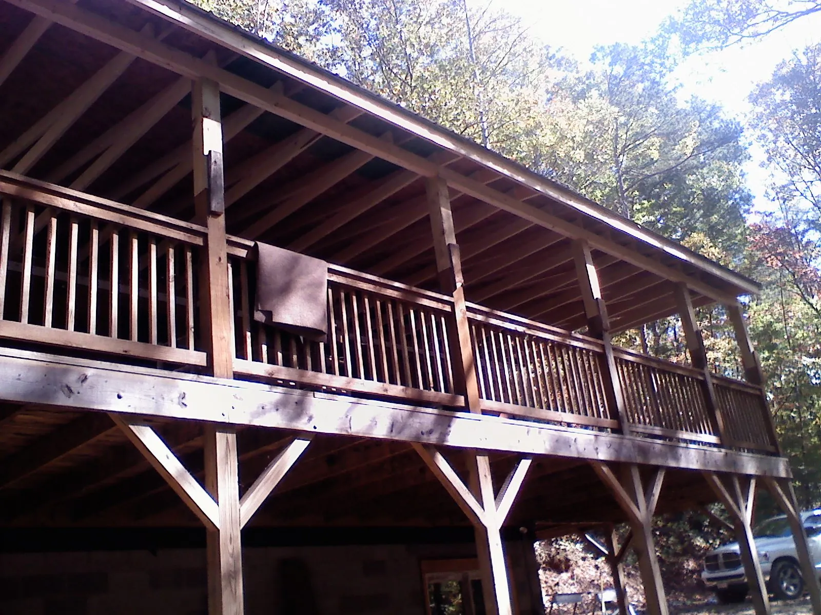 Timber framing under a new elevated porch and deck — Roof Leak Repair in Weyauwega by Roofing Brothers